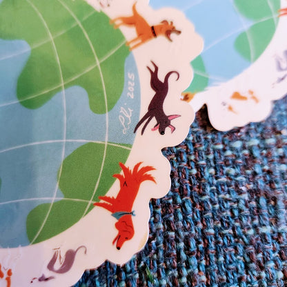 Dogs around the globe sticker